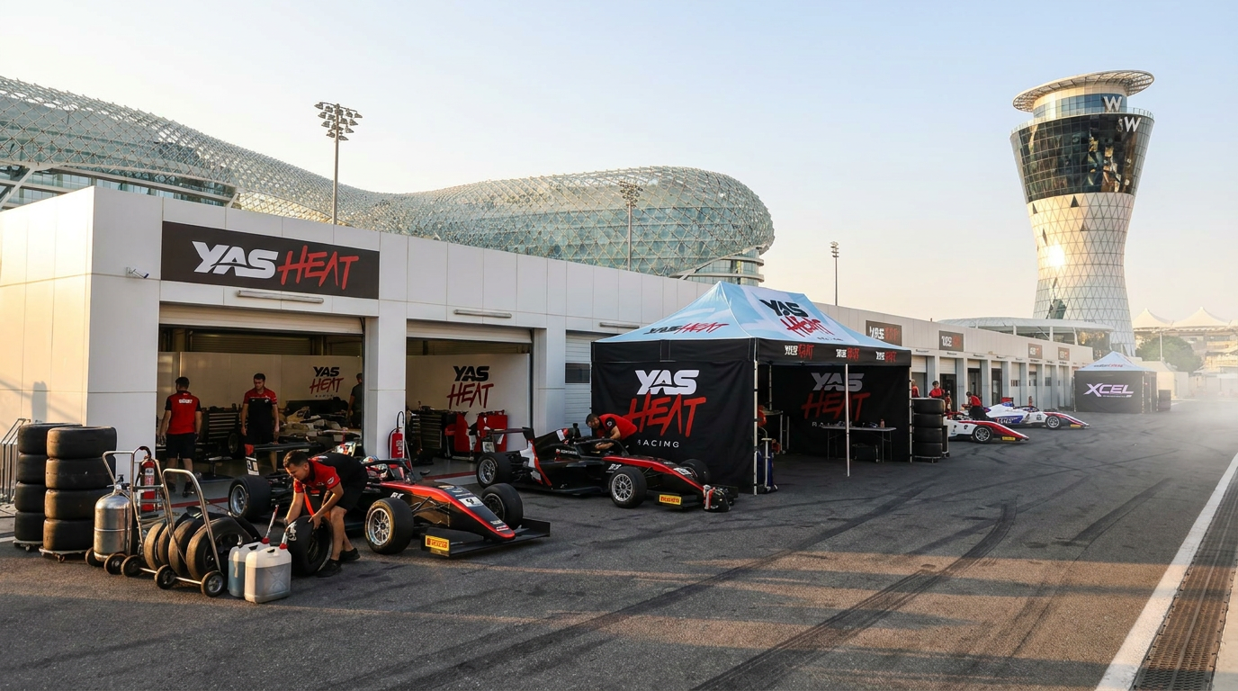 Single seater paddock with branded canopy tent at a Formula circuit